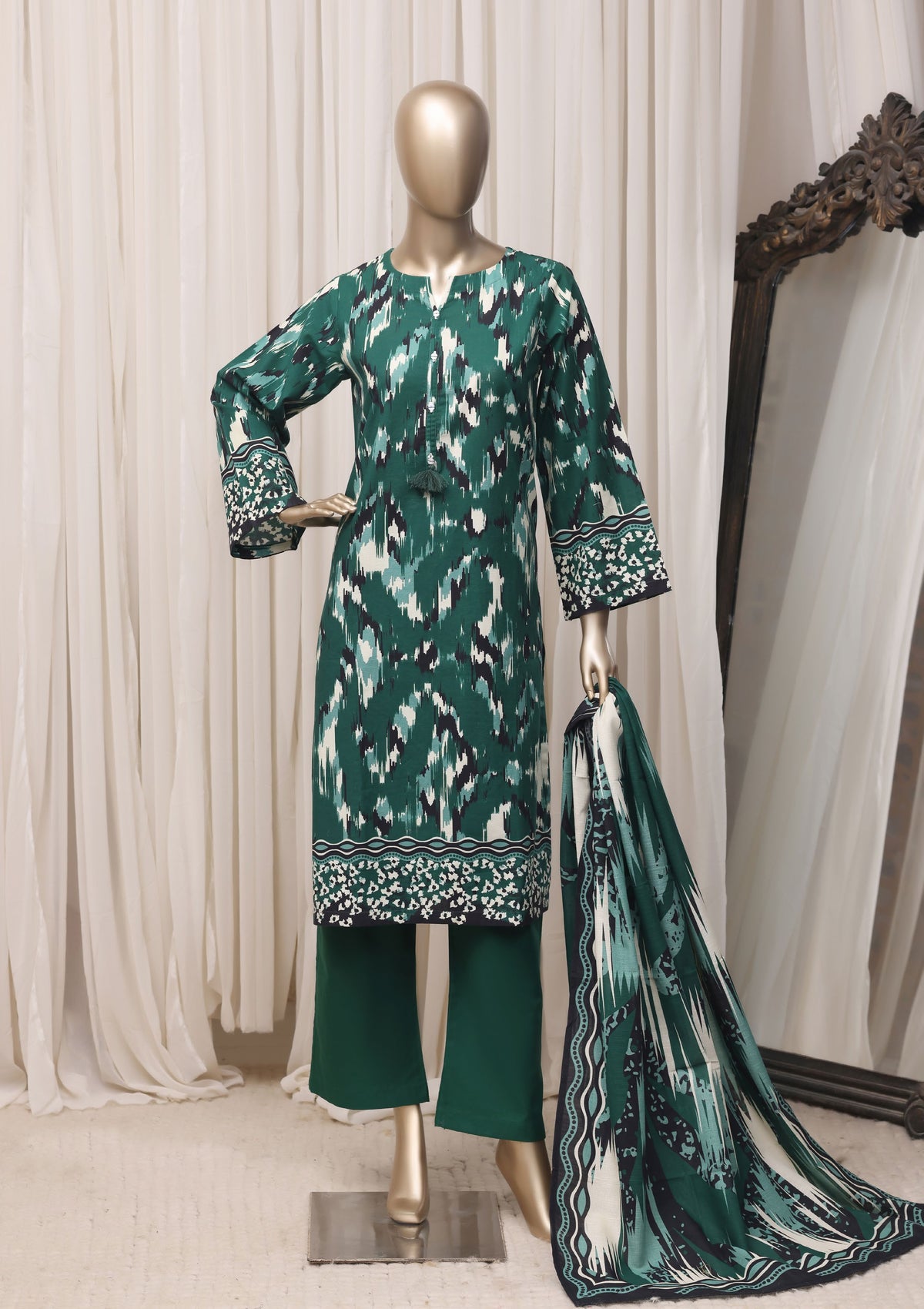 Sada Bahar emerald green printed khaddar 3 piece suit, full mannequin view