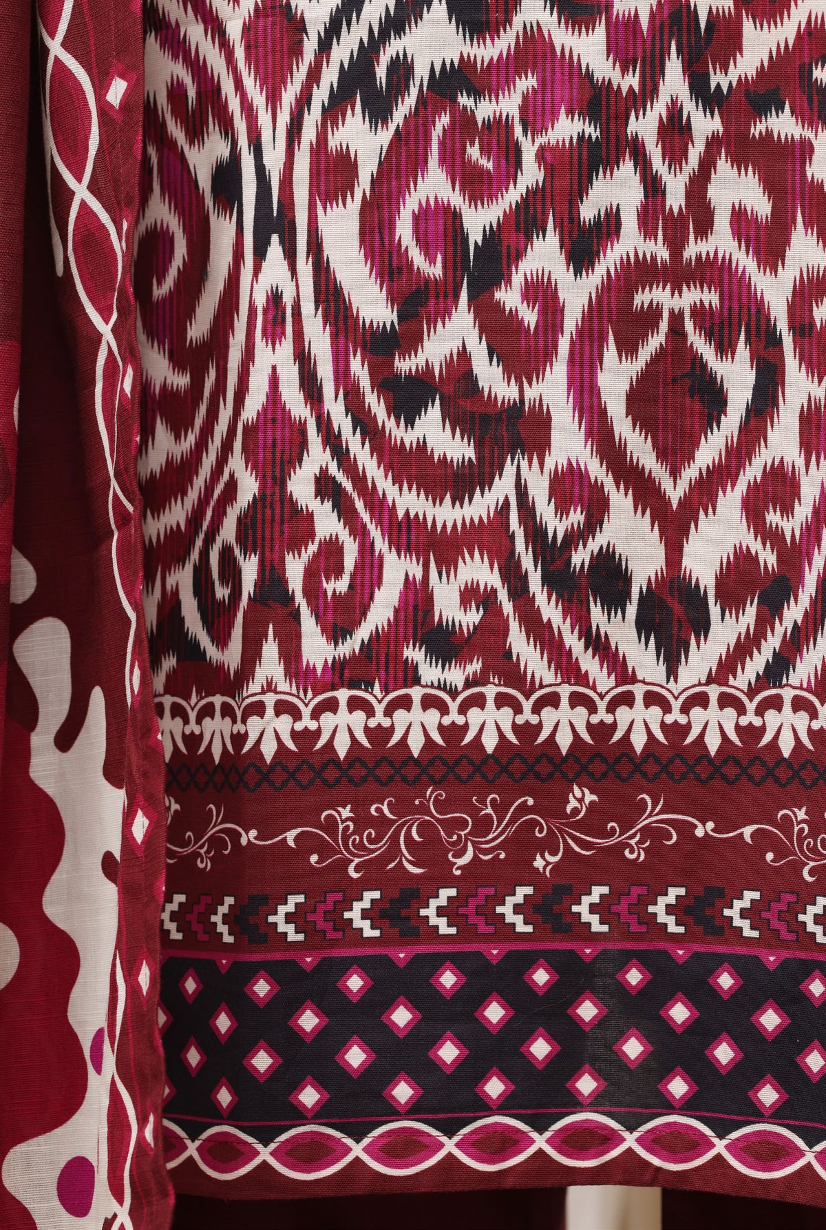 Sada Bahar maroon suit sleeve detail